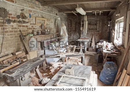 Old traditional carpenter's workshop with its wealth of tools and wood 