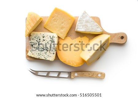 Different kinds of cheeses isolated on white background. Top view.