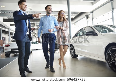 Salesman presenting special offers to clients