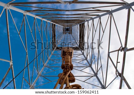 Interior upward view of an old oil rig