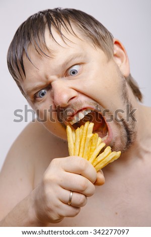 stock-photo-man-eating-fries-342277097.j