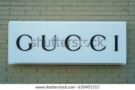 WOODBURY, NEW YORK - OCT 26 : Gucci signboard at Woodbury Common Premium Outlet on Oct 26, 2016 in Woodbury, New York, USA.