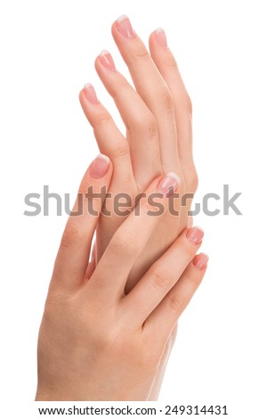 Beautiful hands with french manicure on white background