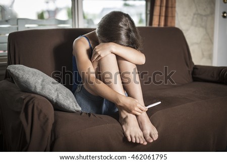stock-photo-young-pregnant-woman-unhappy-with-the-test-that-he-wants-to-have-an-abortion-462061795.jpg