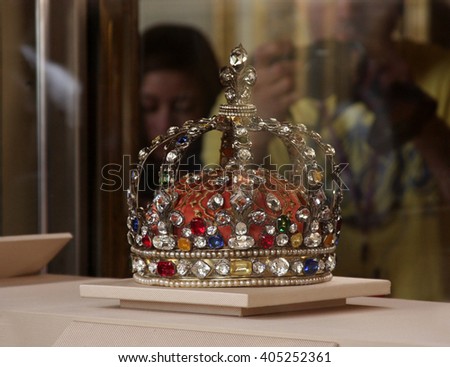 LONDON, ENGLAND - JUNE 12, 2015: The British Crown Jewels on display at the Tower of London. The jewels were moved from Westminster Abbey to the Tower of London due to a series of thefts.