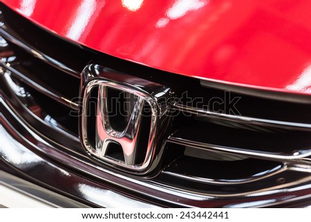 BUCHAREST, ROMANIA - OCTOBER 31, 2014: Honda Sign Close Up. Since 1959 is a Japanese public multinational corporation primarily known as a manufacturer of automobiles, motorcycles and power equipment.