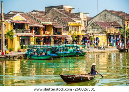 HOI AN, VIETNAM - FEBRUARY 5, 2015: Traditional boats in Hoi An. Hoi An is the World's Cultural heritage site, famous for mixed cultures & architecture.