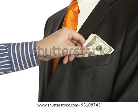 stock-photo-giving-a-bribe-into-a-pocket-horizontal-shot-dollar-banknotes-95108743.jpg