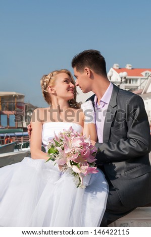 stock photo wedding couple happy bride and groom embracing near sea loving newlywed couple together beautiful 146422115