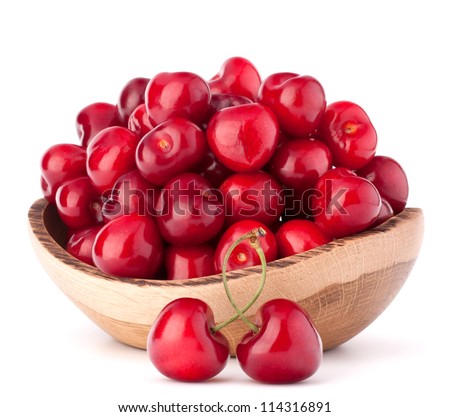 cherry berries in wooden bowl isolated on white background cutout - stock photo