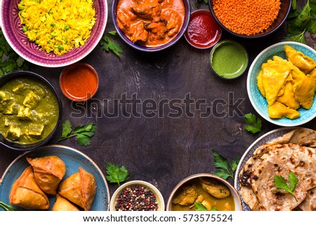 Assorted Indian Food On Dark Wooden Stock Photo 573575524 