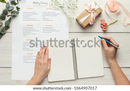 wedding background checklist calendar female hands stock photo