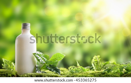 cosmetic bottle on nature background