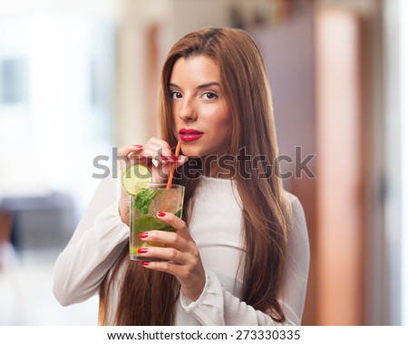 https://thumb7.shutterstock.com/display_pic_with_logo/1601927/273330335/stock-photo-elegant-woman-drinking-a-mojito-273330335.jpg