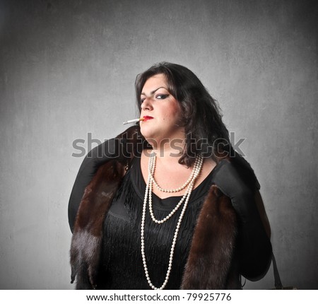 https://thumb7.shutterstock.com/display_pic_with_logo/160669/160669,1309002665,1/stock-photo-fat-elegant-woman-with-snobbish-expression-79925776.jpg