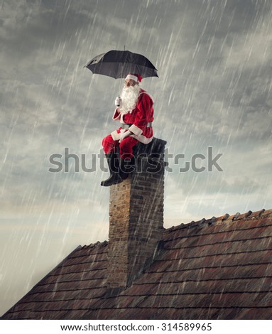 Santa Claus under the rain