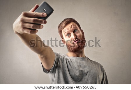 stock-photo-weird-man-doing-a-selfie-409650265.jpg