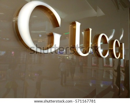 Kuala Lumpur, Malaysia - February 2, 2017: Close up view of Gucci brand logo. It is a multinational luxury fashion company known for accessories and gifts for women and men