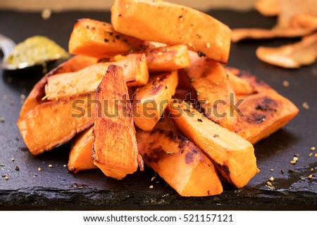 Sweet potato pieces on slate plate