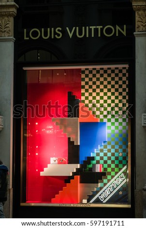 Milan, Italy - February 28, 2017: Shop window of a Louis Vuitton shop in Milan - Montenapoleone area, Italy. Few days after Milan Fashion Week. Spring Summer 2017 Collection. Louis Vuitton logo