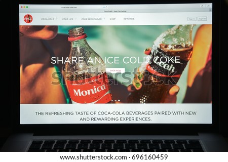 Milan, Italy - August 10, 2017: Coca cola website homepage. It is is a carbonated soft drink produced by The Coca-Cola Company. Cola logo visible.
