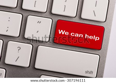 keyboard button with word we can help - stock photo
