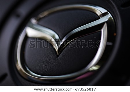 KYIV, UKRAINE - AUGUST 05, 2017: Mazda car logo on the steering wheel August 05, 2017 in Kiev, Ukraine.