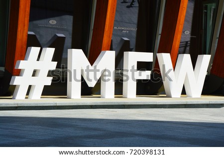 MILAN, ITALY - SEPTEMBER 22, 2017: Milan Fashion Week logo #MFW. Milan Fashion Week is a clothing trade show held semi-annually in Milan, Italy
