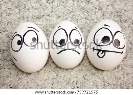 Drawing Faces On Eggs Stock Images, Royalty-Free Images & Vectors