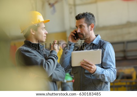 shipping manager and a worker