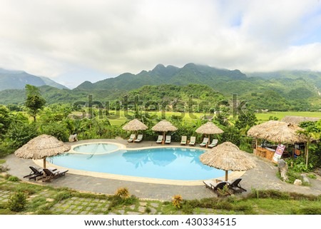 HOA BINH - VIETNAM MAY 29: Beautiful reflections at a resort pool in Hoa Binh province, Vietnam on May 29, 2016