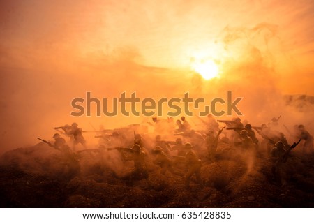 War Concept. Military silhouettes fighting scene on war fog sky background, World War Soldiers Silhouettes Below Cloudy Skyline At night. Attack scene. Armored vehicles. Tanks battle. Decoration
