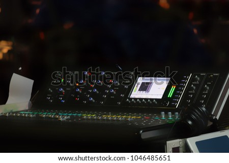 Blurry background of set of digital studio sound and music mixer for music recording, radio or tv broadcasting.