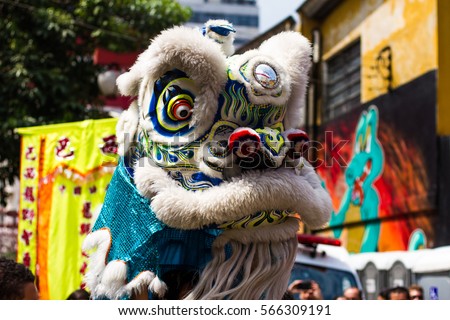The Lion Dancing at the arrival of the Chinese New Year