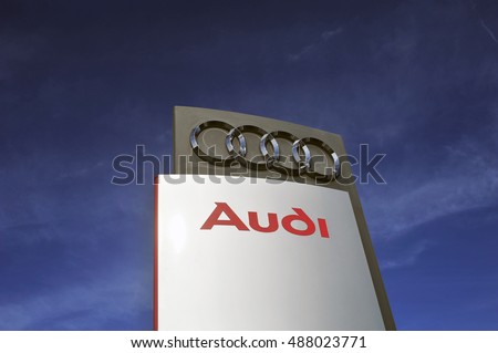 GERMANY-SEPT 22:AUDI logo in the blue sky on September 22,2016 in Germany.Audi is a German automobile manufacturer that designs, engineers, produces, markets and distributes luxury vehicles in Bavaria
