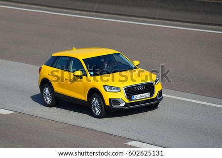 FRANKFURT,GERMANY-MARCH 16: Audi car on the freeway on March 16,2017 in Frankfurt,Germany.Audi-German automobile manufacturer that designs,engineers, produces, markets and distributes luxury vehicles.