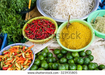 Fresh vegetables and spices at vietnamese street market, Vietnam.