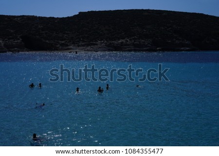 https://thumb7.shutterstock.com/display_pic_with_logo/167494286/1084355477/stock-photo-blue-lagoon-in-malta-island-1084355477.jpg