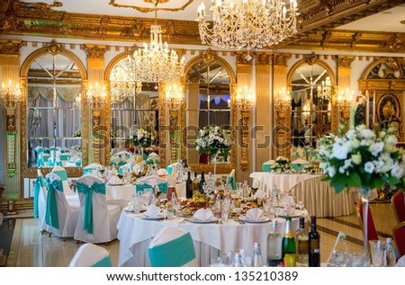 Served for banquet tables in a luxurious interior. - stock photo