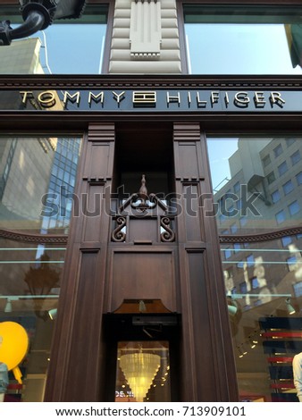 BUDAPEST, HUNGARY - AUGUST 3, 2017: Facade of a Tommy Hilfiger shop in Budapest, Hungary. This American multinational corporation designs and manufactures upper market apparel for men and women.