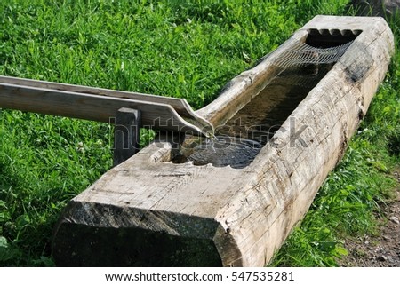 [Image: stock-photo-wooden-water-trough-in-south...535281.jpg]