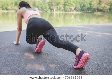 https://thumb7.shutterstock.com/display_pic_with_logo/170487594/706361035/stock-photo-woman-exercising-in-the-park-706361035.jpg