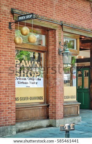 https://thumb7.shutterstock.com/display_pic_with_logo/1713727/585461441/stock-photo-new-haven-connecticut-usa-circa-a-storefront-on-crown-street-modified-to-look-like-a-pawn-585461441.jpg