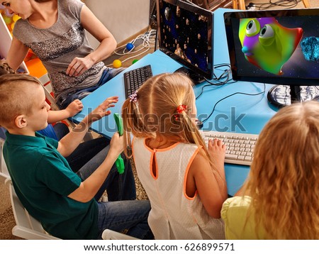 https://thumb7.shutterstock.com/display_pic_with_logo/172021/626899571/stock-photo-children-computer-class-us-for-education-and-video-game-boys-and-girls-in-children-s-club-who-626899571.jpg