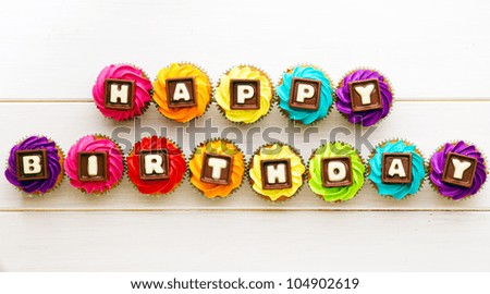 Happy birthday cupcakes - stock photo