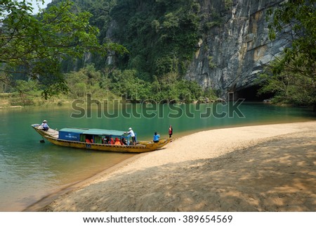 QUANG BINH, VIET NAM- FEB 22: Phong Nha, Ke Bang cave, an amazing, wonderful cavern at Bo Trach, Vietnam, is world heritage of Viet Nam, traveller visit by boat on water, Feb 22, 2016