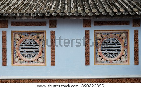 HUE, VIET NAM- FEB 19, 2016: Citadel, an culture heritage with Hoang Thanh (Imperial City),Tu Cam Thanh (Forbidden City), Dai Noi (Inner city), ngo mon (noon gate), detail of roof of ancient Vietnam