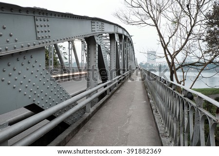 HUE, VIET NAM- FEB 19, 2016: Truong Tien Bridge, cross Huong river, an old bridge link with history, Trang Tien brigde reflect on water, old architect, make from steel, landscape at evening, Vietnam