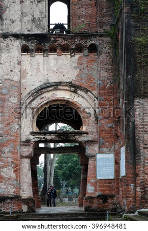 QUANG TRI, VIET NAM- FEB 20, 2016: Old church at La Vang holy land with ancient red brick wall, a place for Christian faithful to go pilgrimage, amazing old architect at Quangtri, Vietnam
