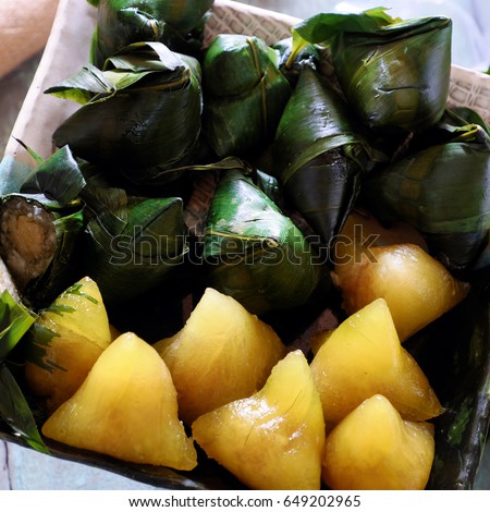Vietnamese traditional food for may 5th, is double five festival or tet doan ngo, sticky rice cake in green leaf, also call banh u tro with pyramidal shape
